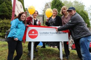 Patrick, a Centred service user cuts the ribbon at a celebratory event to celebrate the launch of Centred. Also in the image is Kate Forbes MSP, Cabinet Secretary for Finance and the Economy; June Jeffrey, the Head of Health and Social Care at Centred; Lorraine Groundwater, Health and Social Care Manager (Lochaber) and Brooke Allan, Media and Communications Officer.